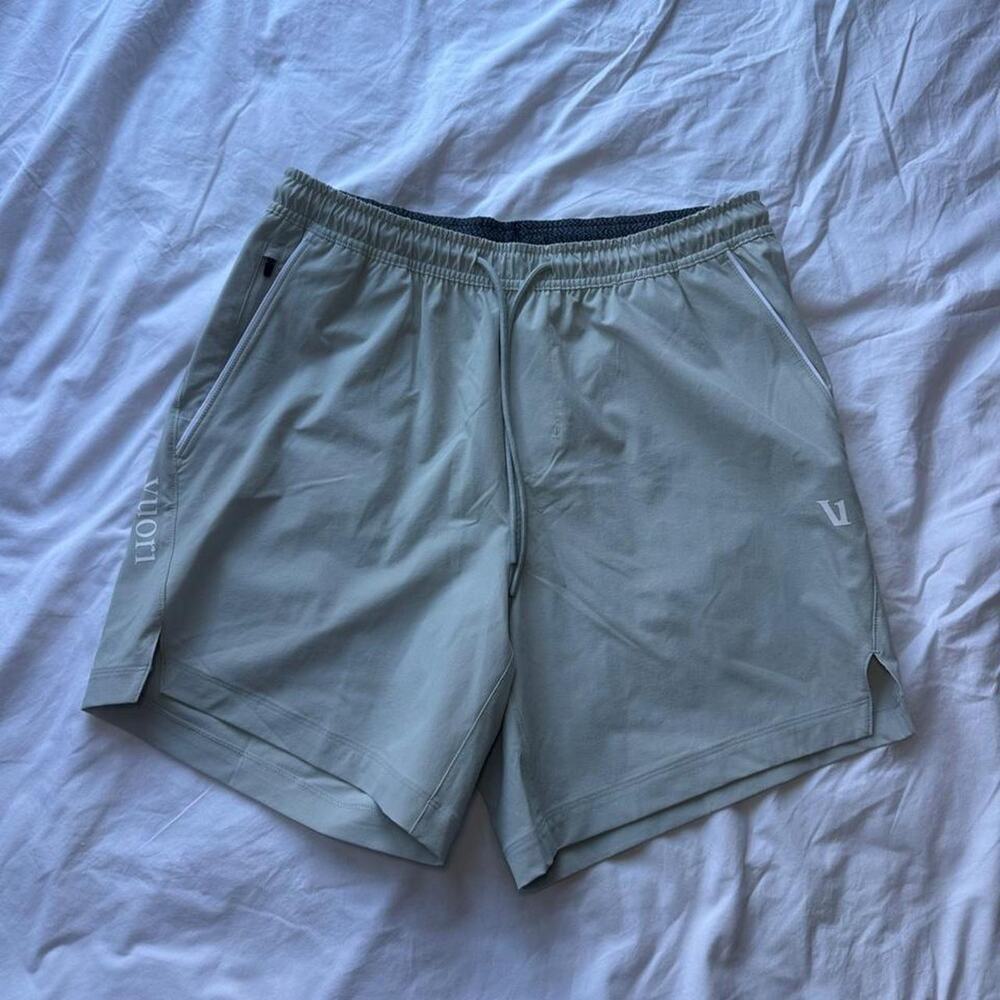 Vuori shorts in sage green